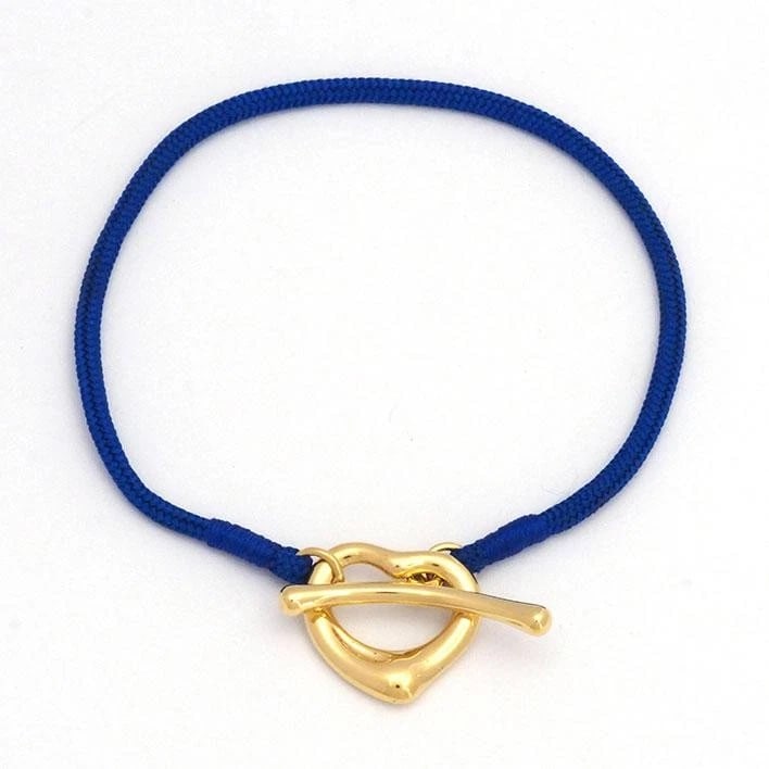 TIFFANY & CO. PERETTI HEART K18 SILK CORD BRACELET: Tiffany & Co. Peretti Heart K18 Silk Cord Bracelet Brand: Tiffany & Co. Type/Style: Bracelet Material: Metal Purity K18, Metal Yellow Gold, Color: Yellow Gold Size: size Arm circumference: approx.