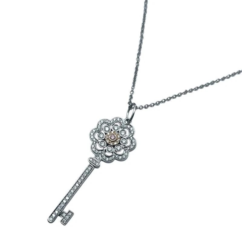 TIFFANY & CO. ROSE KEY DIAMOND K18PG PT950 NECKLACE: Tiffany & Co. Rose Key Diamond K18PG Pt950 Necklace Brand: Tiffany & Co. Type/Style: Necklace Material: Metal Purity K18/Pt950, Metal Pink Gold / Platinum, Main Stone/Creation Natural Color: Pink G