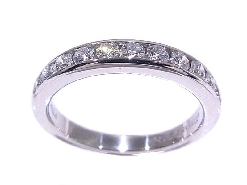 TIFFANY & CO. PLATINUM HALF ETERNITY DIAMOND RING: Tiffany & Co. Platinum Half Eternity Diamond Ring Brand: Tiffany & Co. Type/Style: Ring Material: Metal Purity Pt950, Metal Platinum, Main Stone/Creation Natural Color: Platinum Size: US 5 Access