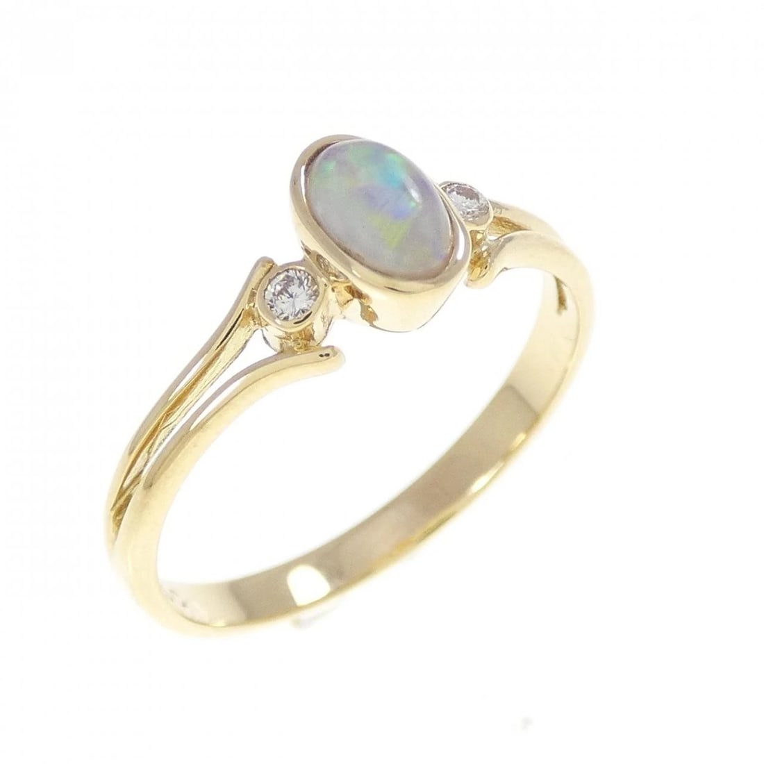 750YG OPAL RING: 750YG Opal Ring Brand: Unbranded Type: Opal Ring Material: 750YG, Main Stone/Creation Opal Secondary Stone Natural Color: Yellow Gold Size: US 6 1/2 Accessories: None Accessories Notice: When