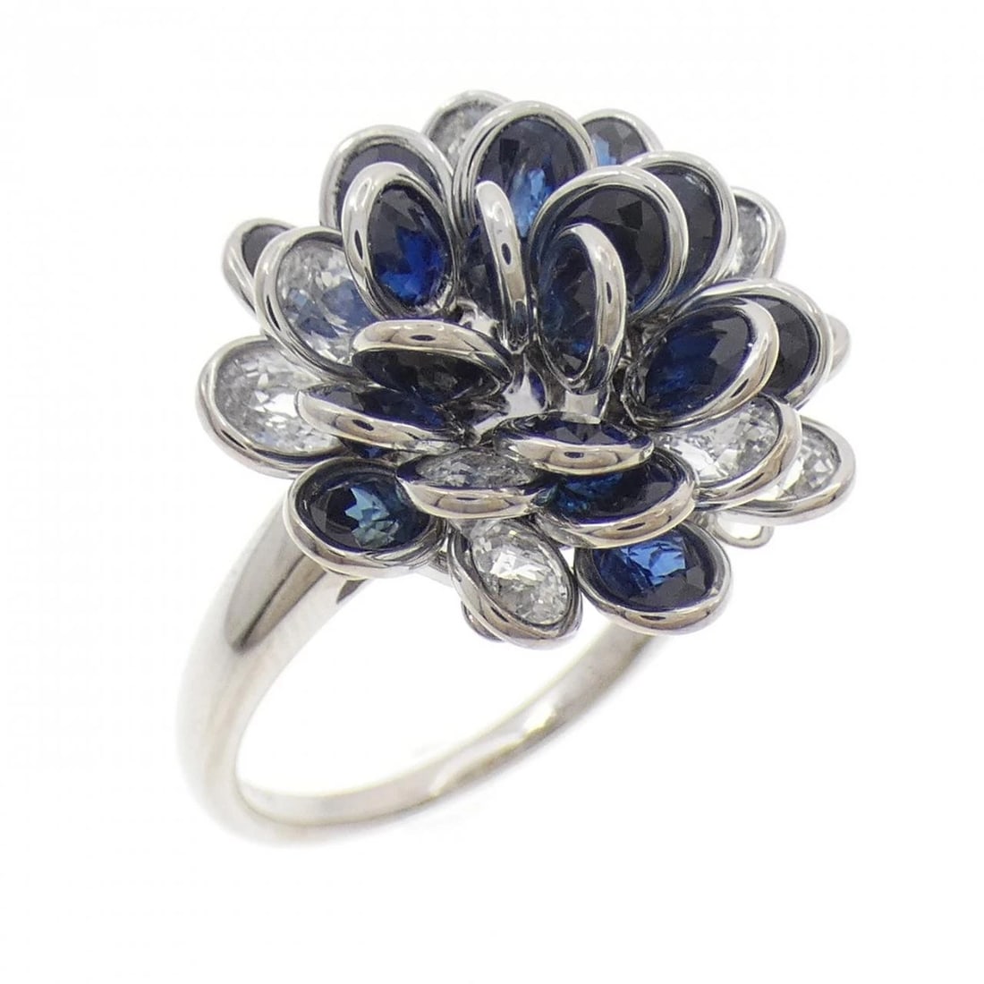K18WG FLOWER SAPPHIRE RING: K18WG Flower Sapphire Ring Brand: Unbranded Type: Sapphire Ring Material: K18 white gold, Main Stone/Creation Sapphire Color: White Gold Size: US 6 1/2 Accessories: None Accessories Notice: