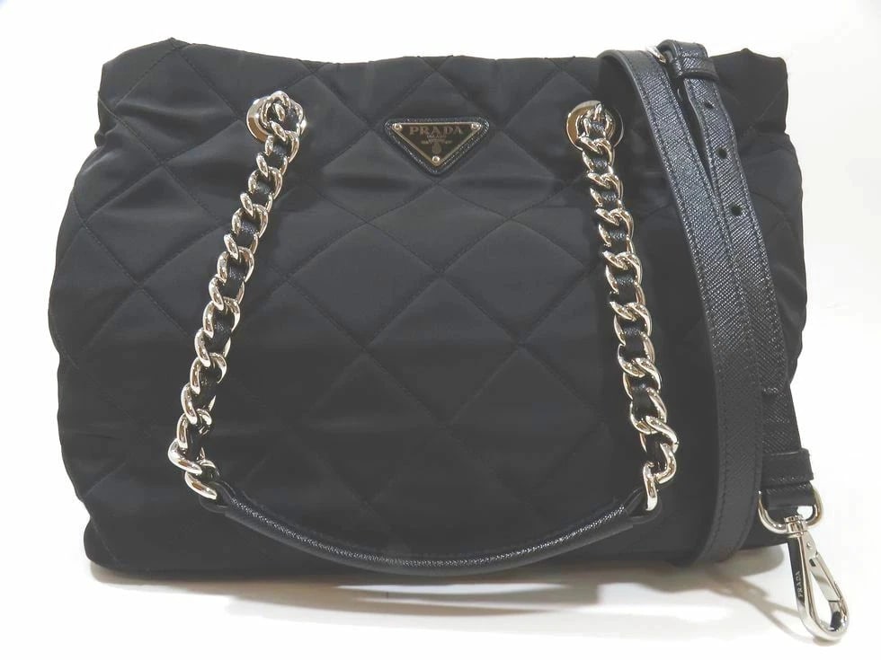 PRADA NYLON LEATHER NERO QUILTED NYLON CHAIN SHOULDER BAG: Prada Nylon Leather Nero Quilted Nylon Chain Shoulder Bag Brand: Prada Type: Handbag Material: Nylon / Leather Nero Color: none Size: W 30× H 22× G 18cm Accessories: None Accessories Notic