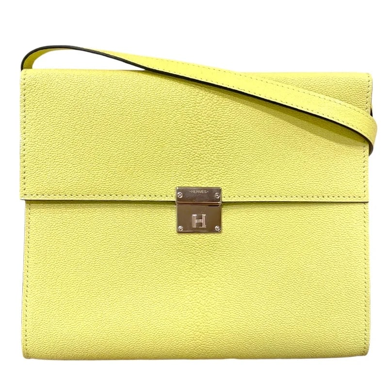 HERMES CLIC 16 Z STAMP JAUNE POUSSIN SHW CHEVRE SHOULDER BAG: HERMES Clic 16 Z Stamp Jaune Poussin SHW Chevre Shoulder Bag Brand: HERMES Type: Handbag Material: Chevre Color: Jaune Plugeon / SV Hardware Size: W: 16.2cm / H: 14cm / D: 2.5cm / Shoulder: