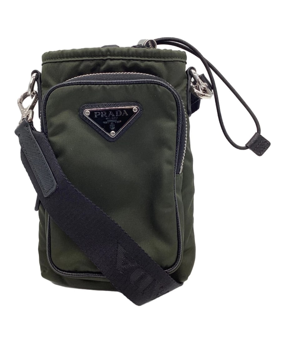 PRADA RE-NYLON SMARTPHONE CASE: PRADA Re-Nylon Smartphone Case Brand: PRADA Type: Handbag Material: Recycled Polyamide Color: Khaki Size: H:18cm / W:13cm / D:6cm Accessories: None Accessories Notice: When purchasing pre-