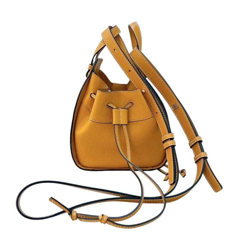 LOEWE HAMMOCK DRAWSTRING MINI CALF LEATHER HANDBAG: LOEWE Hammock Drawstring Mini Calf Leather Handbag Brand: LOEWE Type: Handbag Material: Calf Calf Color: none Size: W: 16cm / H: 18cm / D: 10.5cm Accessories: None Accessories Notice: When