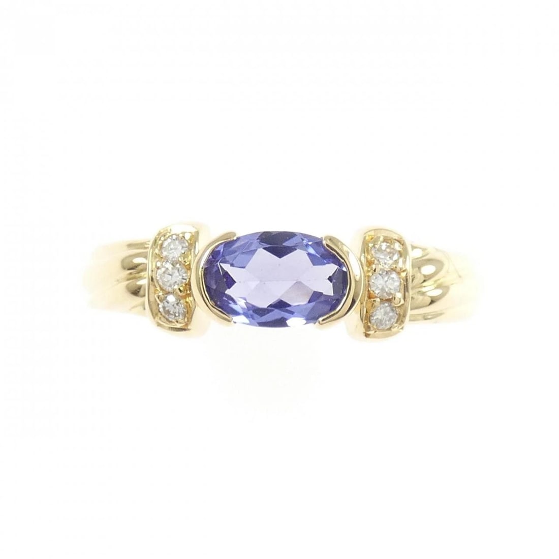 K18YG TANZANITE RING: K18YG Tanzanite Ring Brand: Unbranded Type: Tanzanite Ring Material: K18 yellow gold, Main Stone/Creation TanzaniteSecondary Stone Natural Color: Yellow Gold Size: US 5 3/4 Accessories: None <