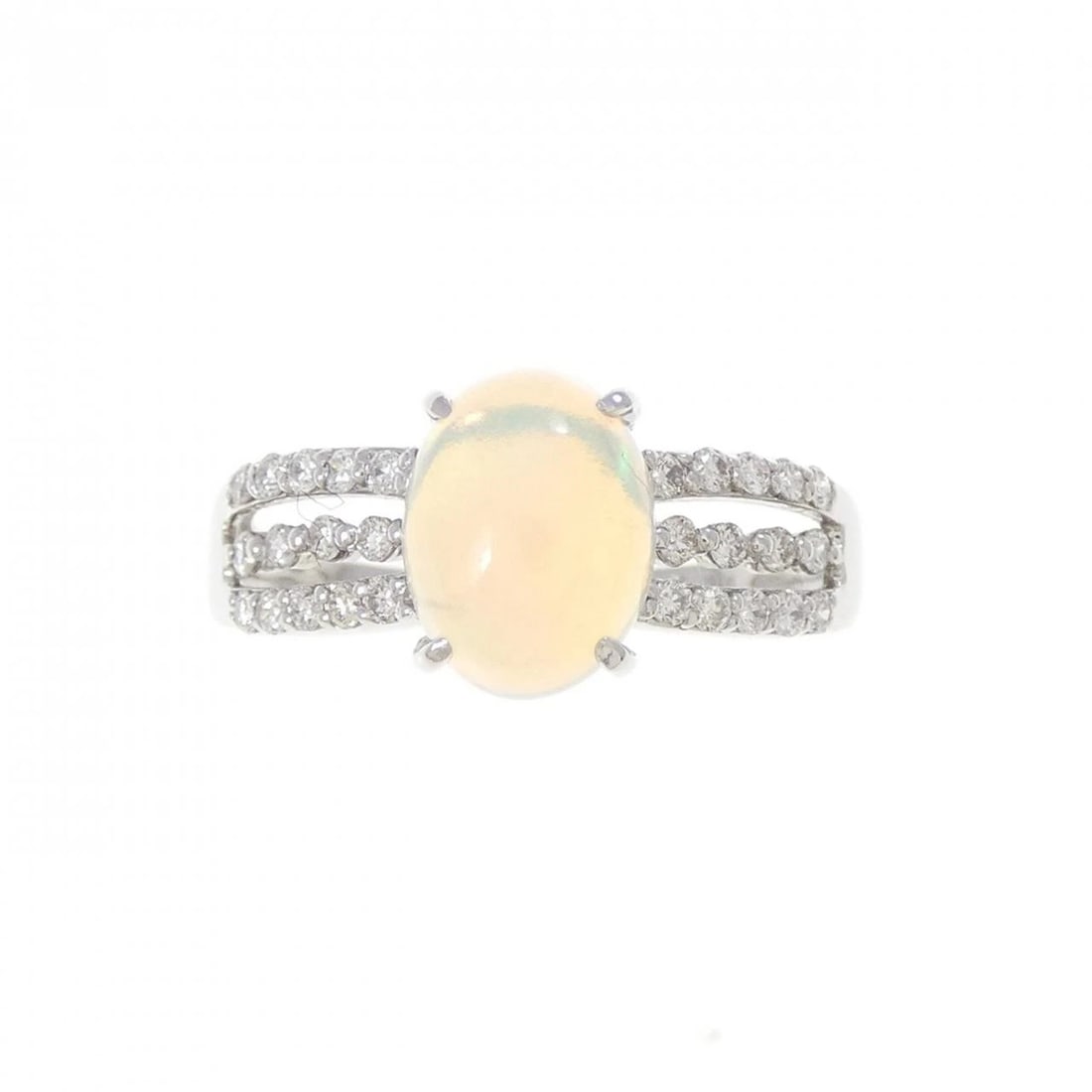 PT900 OPAL RING: PT900 Opal Ring Brand: Unbranded Type: Opal Ring Material: Platinum900, Main Stone/Creation OpalSecondary StoneNatural Color: Silver Size: US 5 1/4 Accessories: None Accessories Notice: When