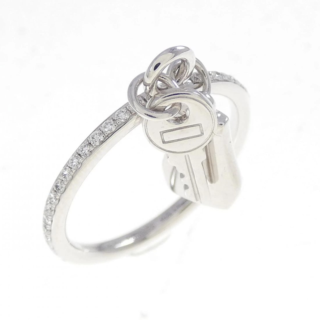 HERMÈS KELLY CLOCHETTE RING: Hermès Kelly Clochette Ring Brand: HERMES Type: Ring Material: 750 white gold, Main Stone/Creation Natural Color: White Gold Size: US 5 1/4 Accessories: None Accessories Notice: When