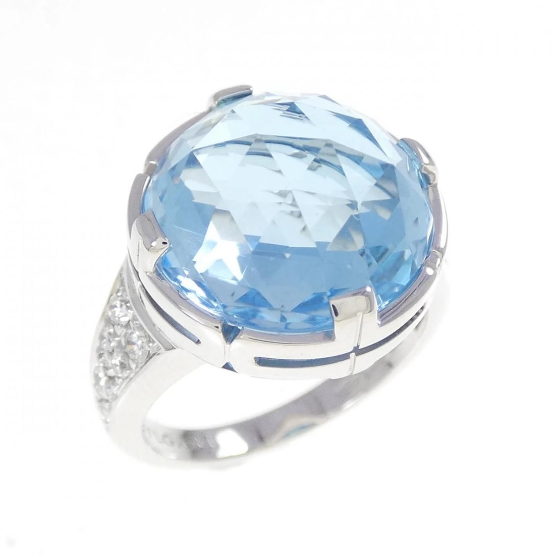 BVLGARI PARENTESI COCKTAIL RING: Bvlgari Parentesi Cocktail Ring Brand: BVLGARI Type: Ring Material: 750WG, Main Stone/Creation Blue Topaz Color: white Size: US 5 1/4 Accessories: None Accessories Notice: When purchasing