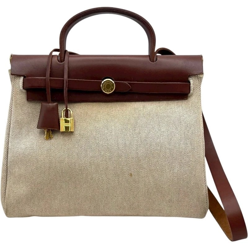 HERMES HERBAG PM ?G STAMP BROWN GHW TOILE SHOULDER BAG: HERMES Herbag PM ?G Stamp Brown GHW Toile Shoulder Bag Brand: HERMES Type: Handbag Material: Toile Color: Brown GD Hardware Size: W: 29cm / H: 25cm / D: 10cm / Shoulder: 97cm Accessories: None