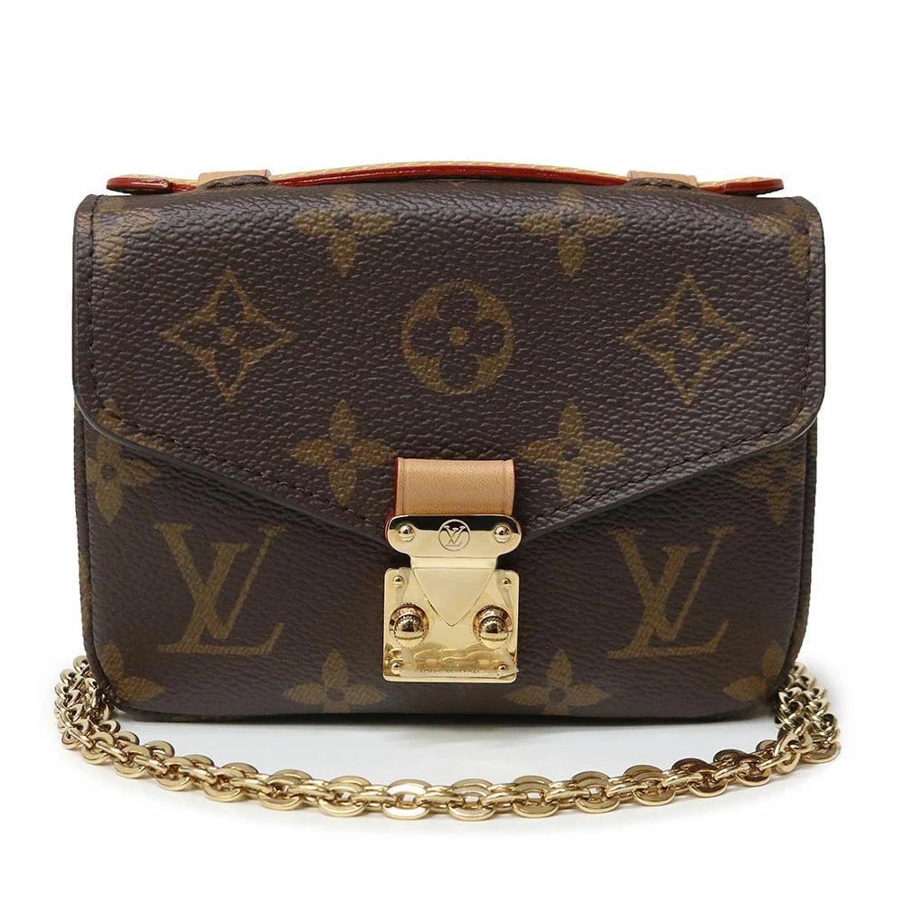 LOUIS VUITTON MICRO METIS POCHETTE SHOULDER BAG MONOGRAM: LOUIS VUITTON Micro Metis Pochette Shoulder Bag Monogram Brand: LOUIS VUITTON Type: Handbag Material: Monogram / Natural Leather Color: Brown Size: W:13cm x H:9.5cm x D:3.5cm Handle:7cm Accessori