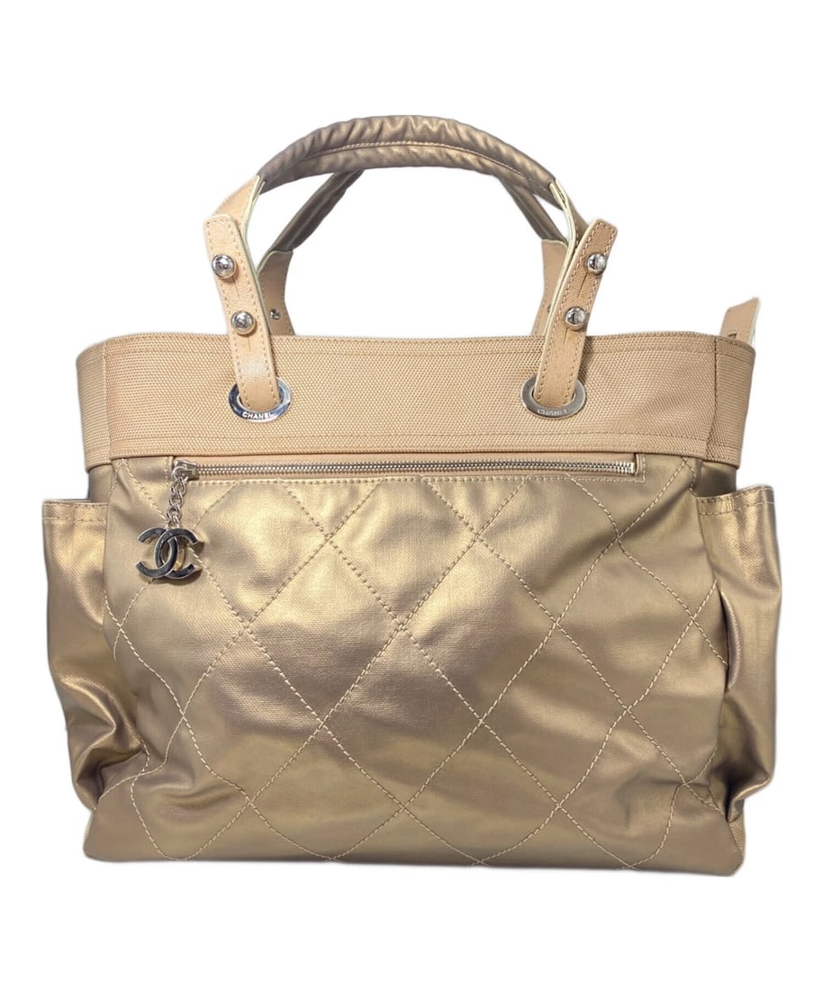 CHANEL PARIS BIARRITZ GM TOTE BAG: CHANEL Paris Biarritz GM Tote Bag Brand: CHANEL Type: Handbag Material: Canvas X Calf Leather Color: Gold X Beige Size: H:29cm / W:38.5cm / D:14cm Accessories: None Accessories Notice: Whe