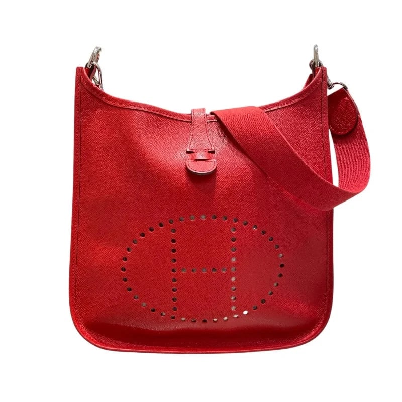 HERMES EVELYNE STAMP ROUGE CASAQUE EPSOM SHOULDER BAG: Hermes Evelyne Stamp Rouge Casaque Epsom Shoulder Bag Brand: HERMES Type: Handbag Material: Epson Color: Rouge Kazak Size: W: 29cm / H: 27cm / D: 8cm / Shoulder: 92cm Accessories: None
