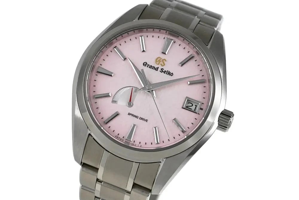 GRAND SEIKO HERITAGE COLLECTION CALIBER: Grand Seiko Heritage Collection Caliber Brand: SEIKO Type: Wrist watch Material: Case Material TI Color: Dial Color Pink Gradient Size: [ Case size ] 41mm [ Arm circumference size ] 20cm Case