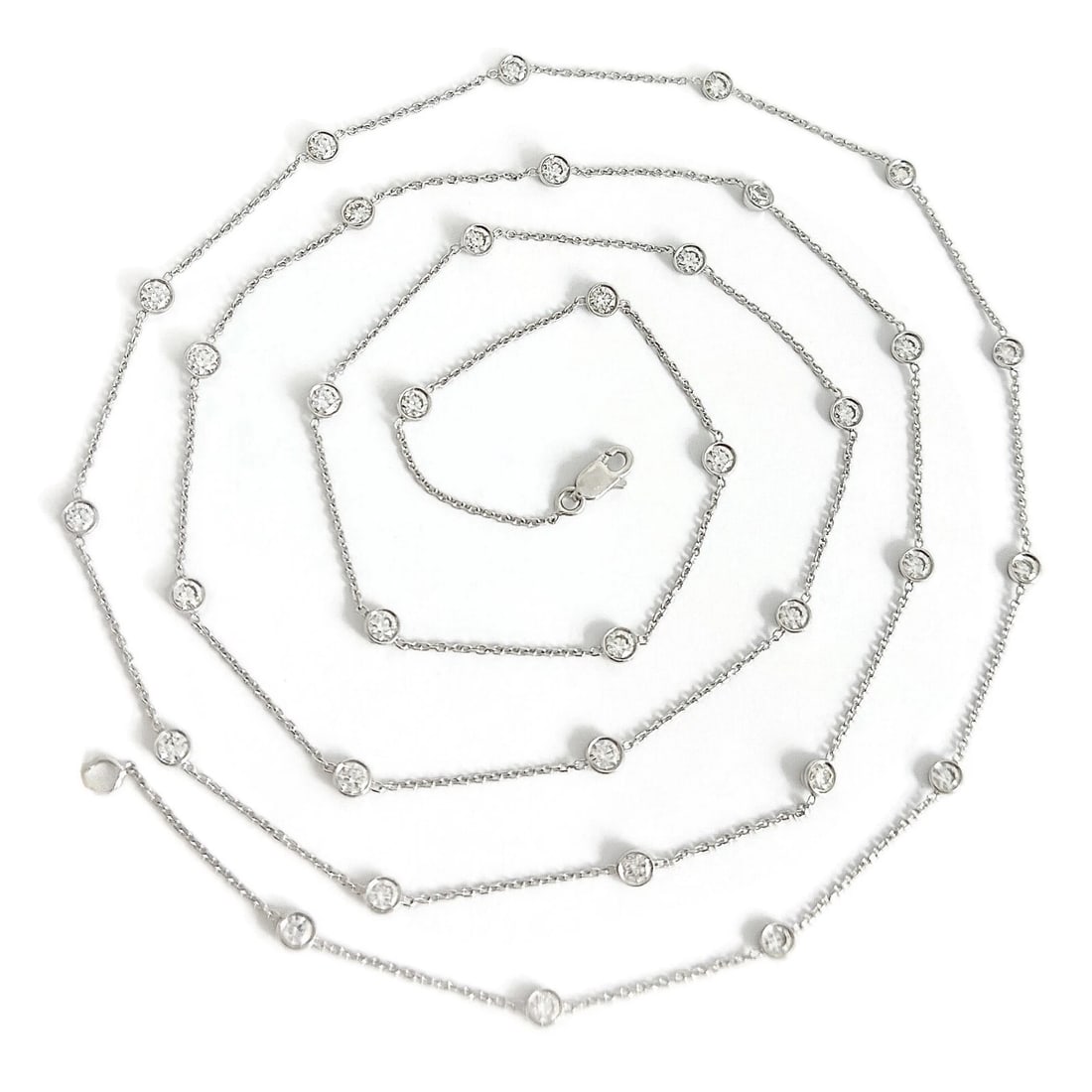 LONG DIAMOND BEZEL STATION NECKLACE 14K WHITE GOLD: Long Diamond Bezel Station Necklace 14K White Gold Brand: Unbranded Type: Necklace Material: 14K white gold, Main Stone/Creation Natural Color: Silver Size: Length: 36.5 inches Accessories: None