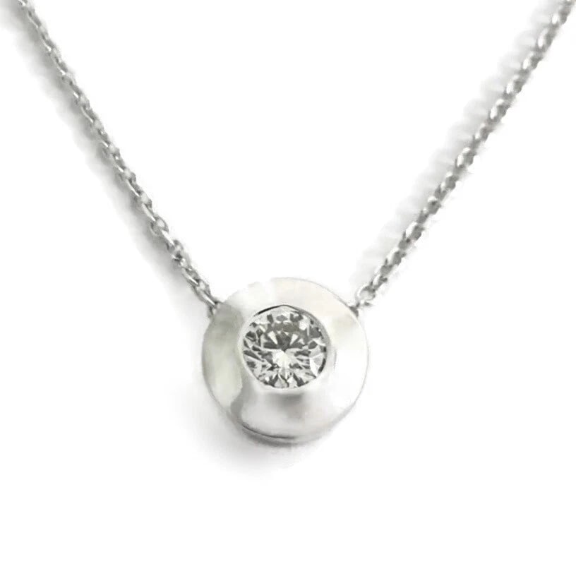 ROUND SOLITAIRE DIAMOND WIDE BEZEL PENDANT NECKLACE: Round Solitaire Diamond Wide Bezel Pendant Necklace Brand: Unbranded Type: Necklace Material: 14K white gold, Main Stone/Creation Natural Color: Silver Size: Length: 16 inches Pendant: 7.5 mm Acc