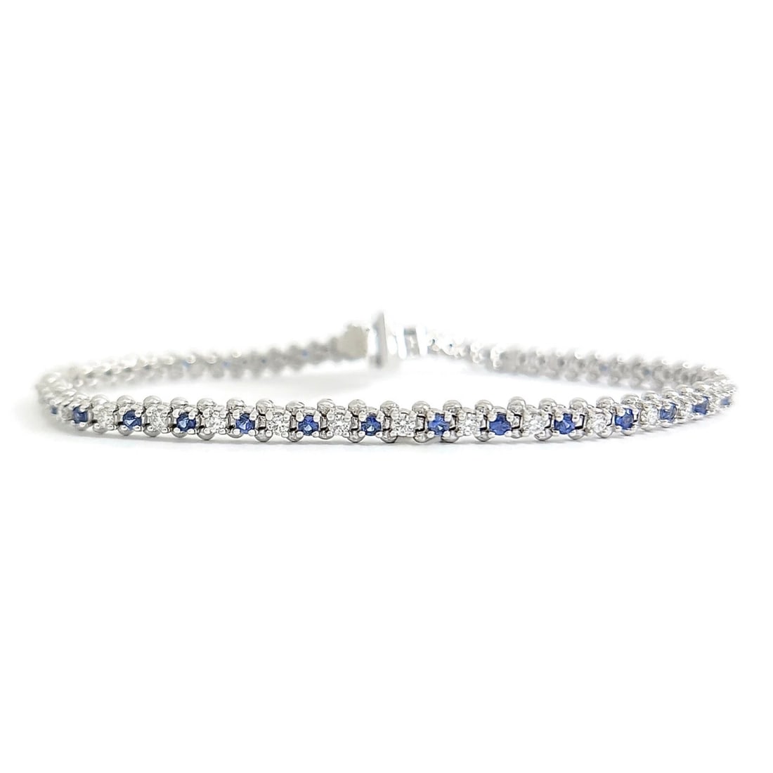 ROUND BLUE SAPPHIRE DIAMOND GEMSTONE TENNIS BRACELET: Round Blue Sapphire Diamond Gemstone Tennis Bracelet Brand: Unbranded Type: Bracelet Material: 14K white gold, Main Stone/Creation Natural Color: Blue Size: Length: 7 inches Width: 3.7 mm Accesso