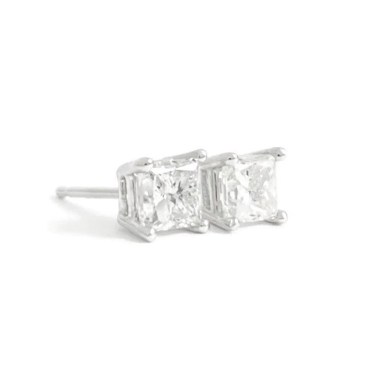 PRINCESS DIAMOND STUD EARRINGS 14K WHITE GOLD: Princess Diamond Stud Earrings 14K White Gold Brand: Unbranded Type: Earrings Material: 14K white gold, Main Stone/Creation Natural Color: Silver Size: Measurements: 4 mm x 4 mm Accessories:
