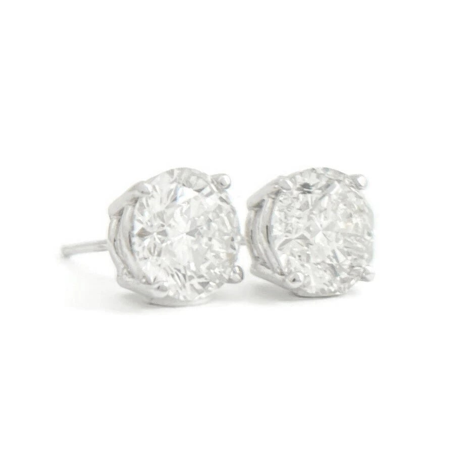ROUND DIAMOND STUD EARRINGS 14K WHITE GOLD: Round Diamond Stud Earrings 14K White Gold Brand: Unbranded Type: Earrings Material: 14K white gold, Main Stone/Creation Natural Color: Silver Size: Measurements: 7.3 mm Accessories: None