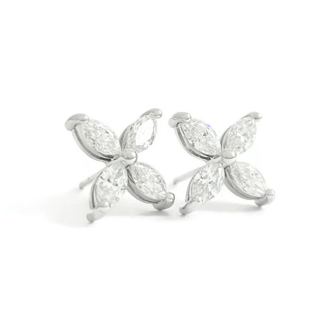 MARQUISE DIAMOND FLOWER CLUSTER STUD EARRINGS: Marquise Diamond Flower Cluster Stud Earrings Brand: Unbranded Type: Earrings Material: 14K white gold, Main Stone/Creation Natural Color: Silver Size: Measurements: 9.7 mm x 9.7 mm Accessories: