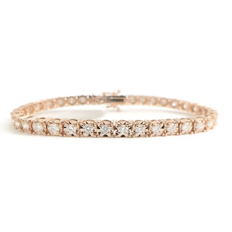 ROUND DIAMOND ILLUSION-SET TENNIS BRACELET 14K PINK ROSE GOLD: Round Diamond Illusion-Set Tennis Bracelet 14K Pink Rose Gold Brand: Unbranded Type: Bracelet Material: 14K rose gold, Main Stone/Creation Natural Color: Gold Size: Length: 7 inches Width: 4.2 mm