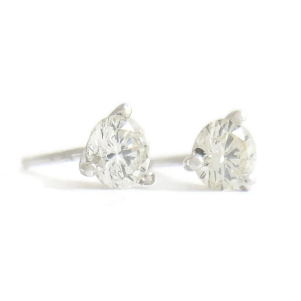ROUND DIAMOND STUD EARRINGS 14K WHITE GOLD: Round Diamond Stud Earrings 14K White Gold Brand: Unbranded Type: Studs Material: 14K white gold, Main Stone/Creation Natural Color: Silver Size: Measurements: 4.1 mm Accessories: None Acc