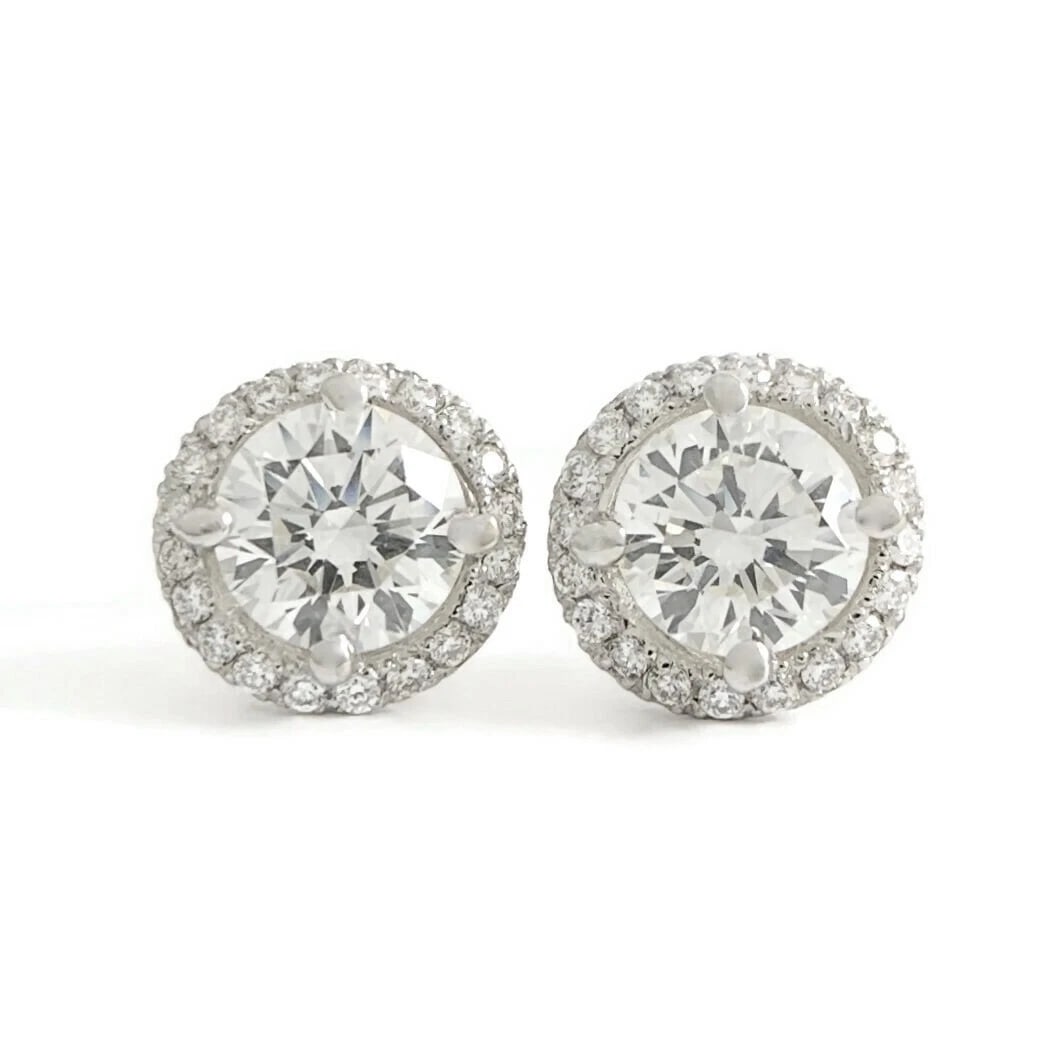 CERTIFIED ROUND DIAMOND HALO STUD EARRINGS: Certified Round Diamond Halo Stud Earrings Brand: Unbranded Type: Studs Material: 14K white gold, Main Stone/Creation Natural Color: White Size: Measurements: 8.3 mm Accessories: None