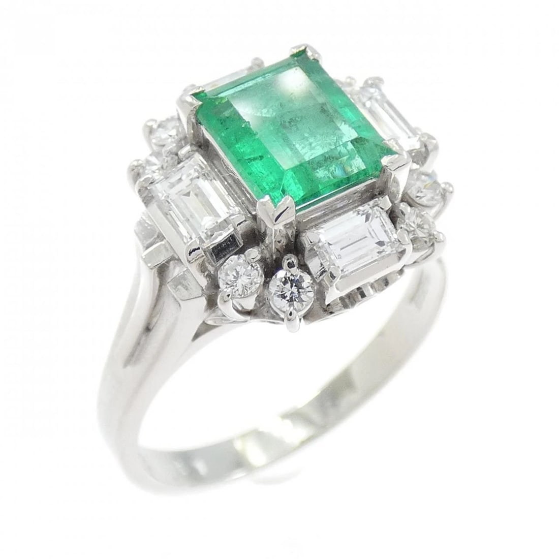 PT900 EMERALD RING: PT900 Emerald Ring Brand: Unbranded Type: Emerald Ring Material: Platinum900, Main Stone/Creation Emerald Color: Platinum Size: US 7 Accessories: None Accessories Notice: When purchasing