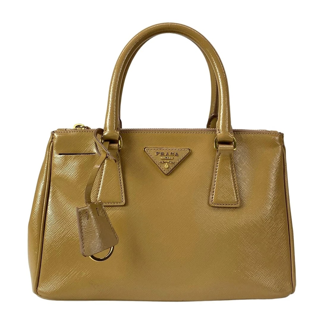 PRADA GALLERIA MINI BAG LIGHT BROWN SAFFIANO VERNIS LEATHER HANDBAG: PRADA Galleria Mini Bag Light Brown Saffiano Vernis Leather Handbag Brand: PRADA Type: Handbag Material: Saffiano Vernis Leather Color: Light Brown Size: Height : 6.89 inch (17.5 cm) Width : 10.63