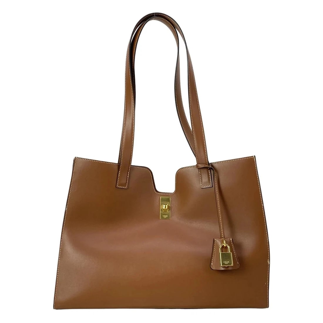 CELINE HIPPO 16 CAISSE - BROWN LEATHER TOTE BAG: CELINE Hippo 16 Caisse - Brown Leather Tote Bag Brand: CELINE Type: Tote Bag Material: Leather Color: Brown Size: Height : 10.24 inch (26 cm) Width : 14.37 inch (36.5 cm) Depth : 5.51 inch (14 cm)
