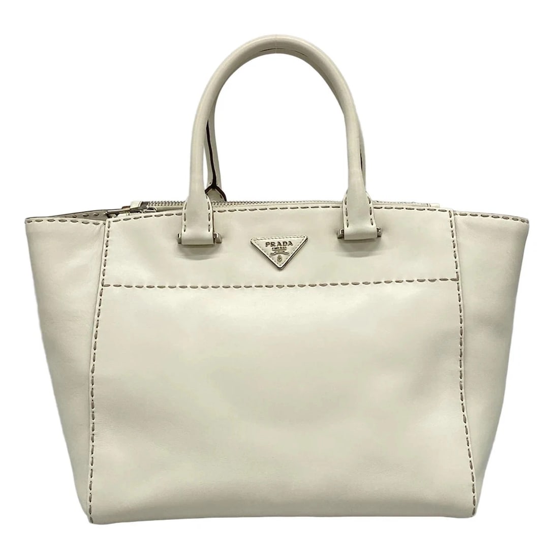 PRADA - CREAM LEATHER TOTE BAG: PRADA - Cream Leather Tote Bag Brand: PRADA Type: Tote Bag Material: Leather Color: Cream Size: Height : 9.45 inch (24 cm) Width : 11.81 inch (30 cm) - 16.93 inch (43 cm) Depth : 6.5 inch (16.5 cm