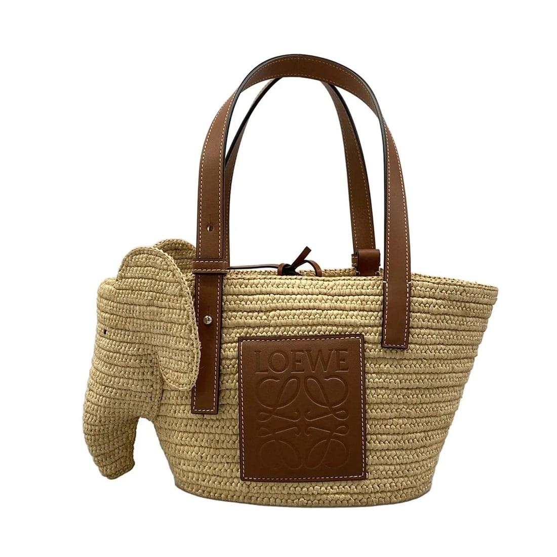 LOEWE ELEPHANT BASKET BAG SMALL - NATURAL TAN RAFFIA CALF TOTE BAG: LOEWE Elephant Basket Bag Small - Natural Tan Raffia Calf Tote Bag Brand: LOEWE Type: Tote Bag Material: Raffia, Calf Color: Natural, Tan Size: Height : 6.89 inch (17.5 cm) Width : 8.27 inch (21 c