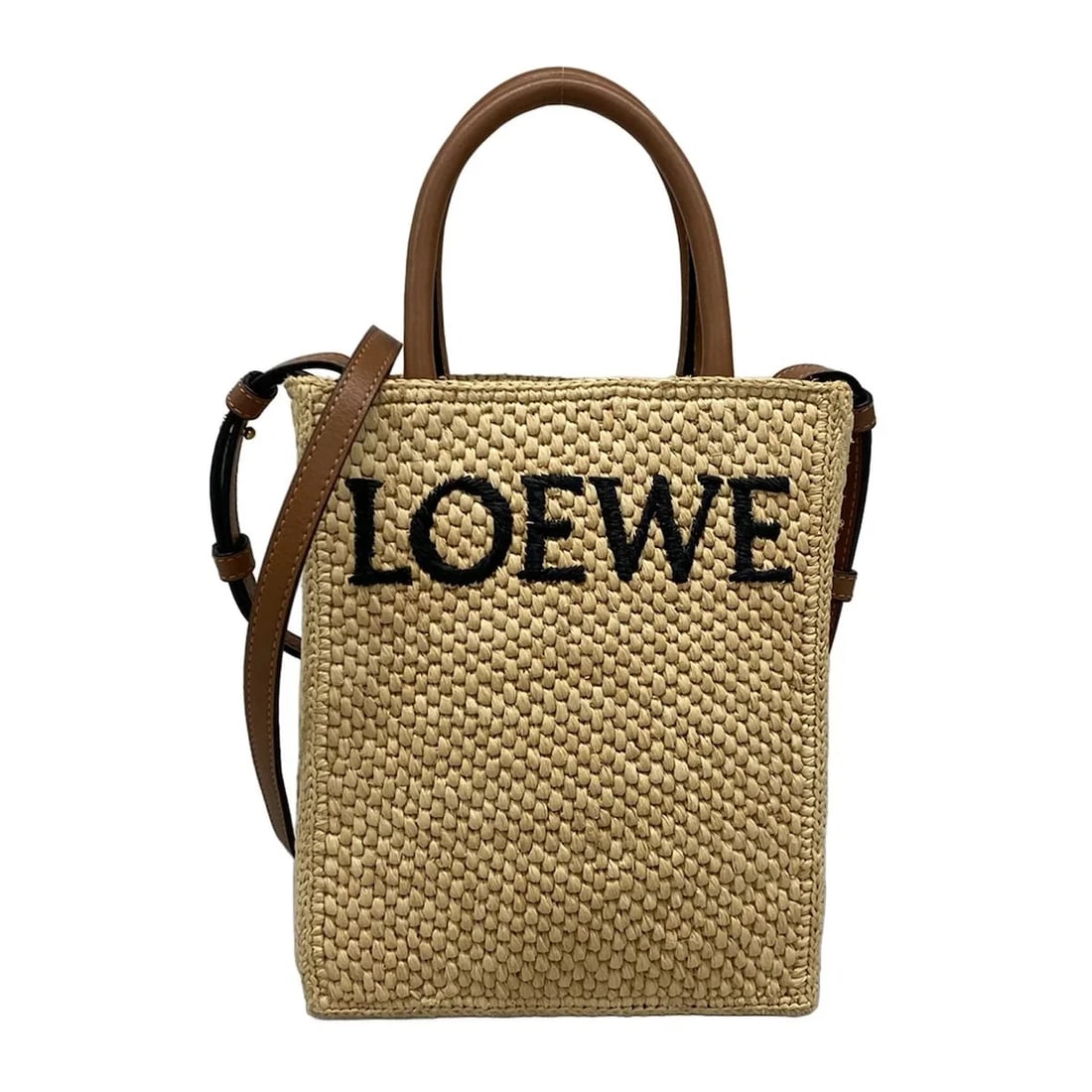 LOEWE STANDARD A5 TOTE BAG BEIGE BROWN RAFFIA: LOEWE Standard A5 Tote Bag Beige Brown Raffia Brand: LOEWE Type: Tote Bag Material: Raffia, Leather Color: Beige, Brown Size: Height : 9.65 inch (24.5 cm) Width : 7.09 inch (18 cm) Depth : 2.56 in