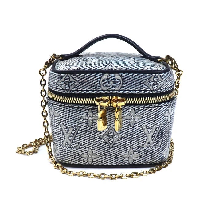 LOUIS VUITTON MONOGRAM LAMINATED JACQUARD MICRO VANITY SHOULDER BAG: LOUIS VUITTON Monogram Laminated Jacquard Micro Vanity Shoulder Bag Brand: LOUIS VUITTON Type: Handbag Material: Monogram Jacquard Denim Color: Navy Size: H9.5cm x D7.5cm Bottom width: 11.5cm