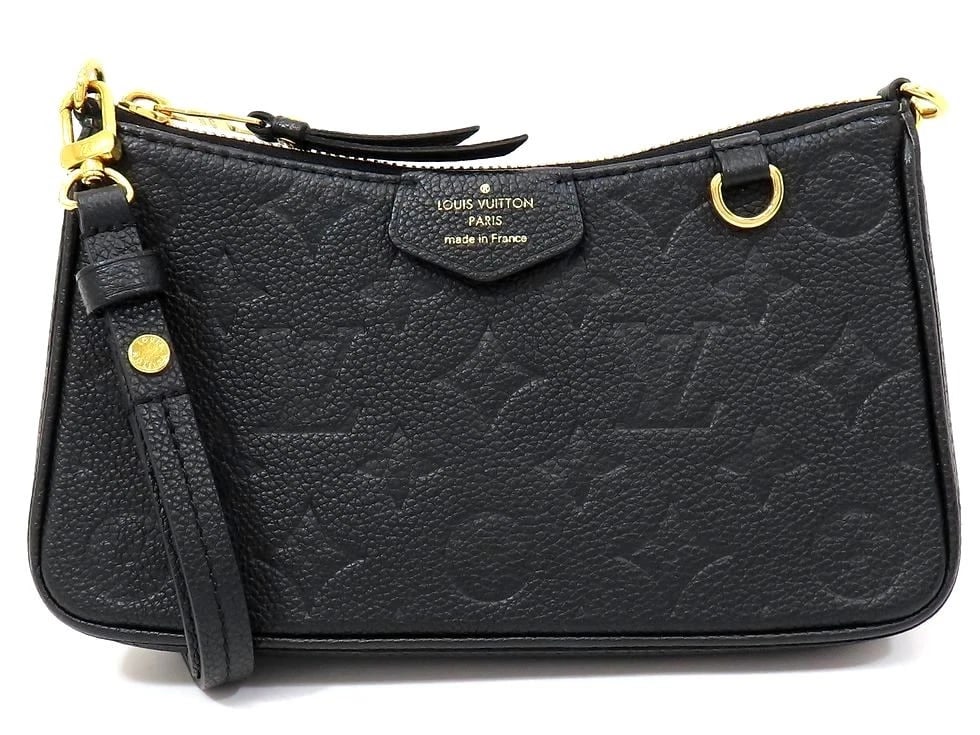 LOUIS VUITTON MONOGRAM EMPREINTE NOIR EASY POUCH SHOULDER BAG: Louis Vuitton Monogram Empreinte Noir Easy Pouch Shoulder Bag Brand: Louis Vuitton Type: Handbag Material: Monogram Empreinte Noir Color: none Size: W 19cm x H 11.5cm x G 3cm / Strap 28-50cm Acce