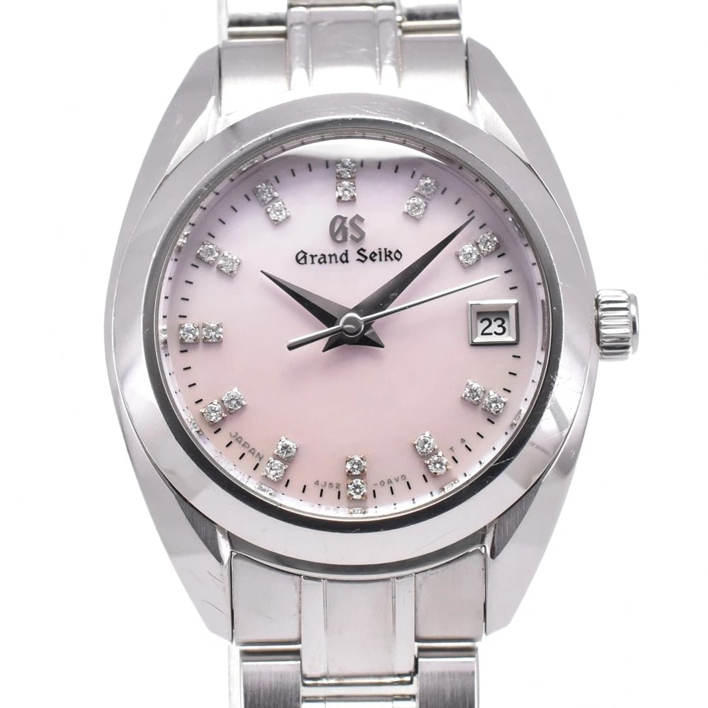 SEIKO DIAMOND PINK SHELL WATCH: SEIKO Diamond Pink shell Watch Brand: SEIKO Type: Wristwatch Material: Band Material Stainless Steel, Case Material Stainless Steel Color: Dial Color pink shell Size: Case size About 26mm