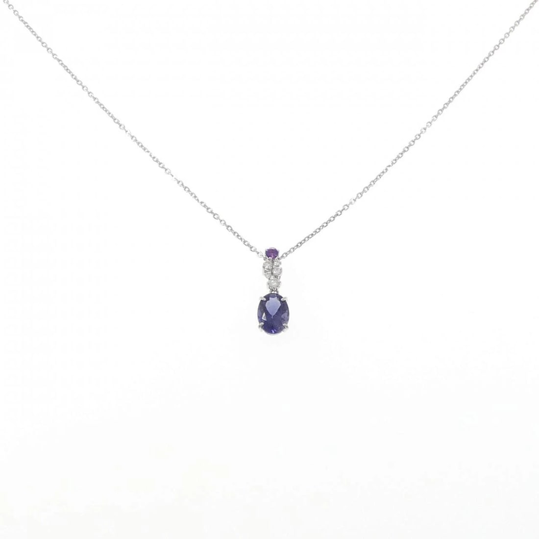 PT900/PT850 IOLITE NECKLACE: PT900/PT850 Iolite Necklace Brand: Unbranded Type: Iolite Necklace Material: Platinum900/Platinum850, Main Stone/Creation Iolite Color: Platinum Size: Actual Size Pendant length approx. x
