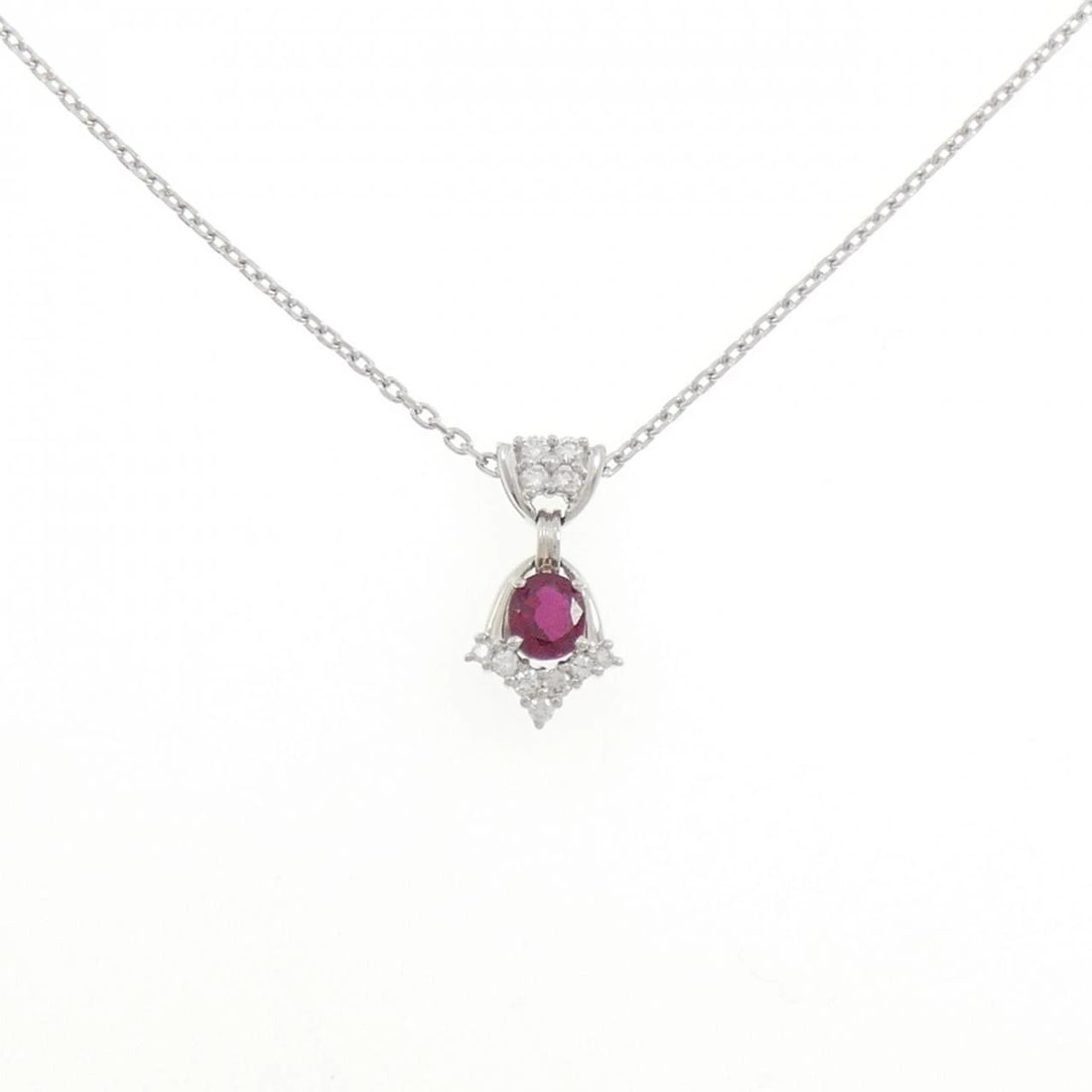 PT900/PT850 RUBY NECKLACE: PT900/PT850 Ruby Necklace Brand: Unbranded Type: Ruby Necklace Material: Platinum900/850, Main Stone/Creation Ruby Color: Platinum Size: Actual Size Pendant length approx. x width approx.: 15.7mmx
