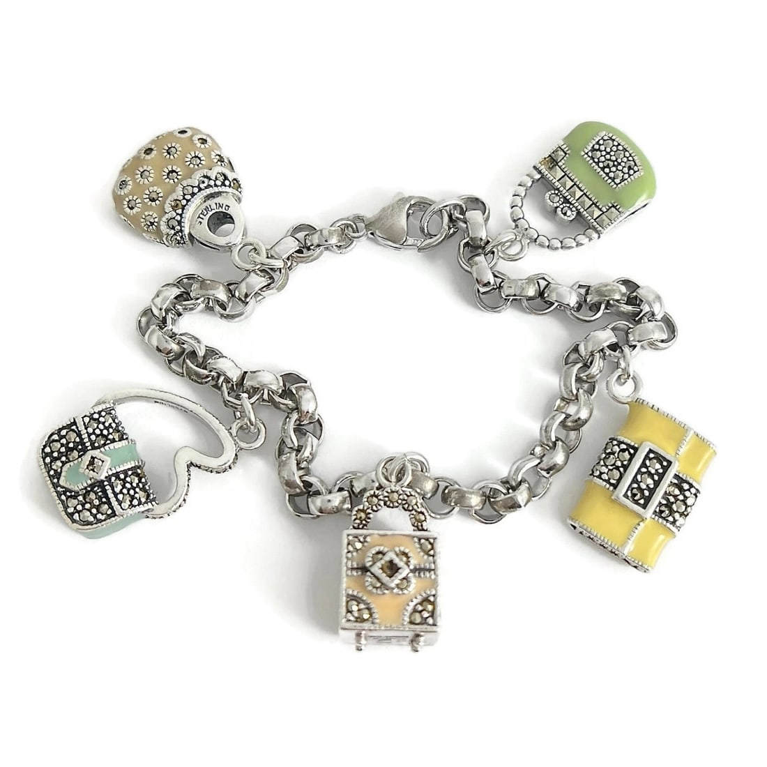 JUDITH JACK ENAMEL PURSE CHARM BRACELET STERLING SILVER: Judith Jack Enamel Purse Charm Bracelet Sterling Silver Brand: Judith Jack Type: Bracelet Material: 925 sterling silver, Color: Multicolor Size: Length: 7.25 inches Width: 5 mm Accessories: None