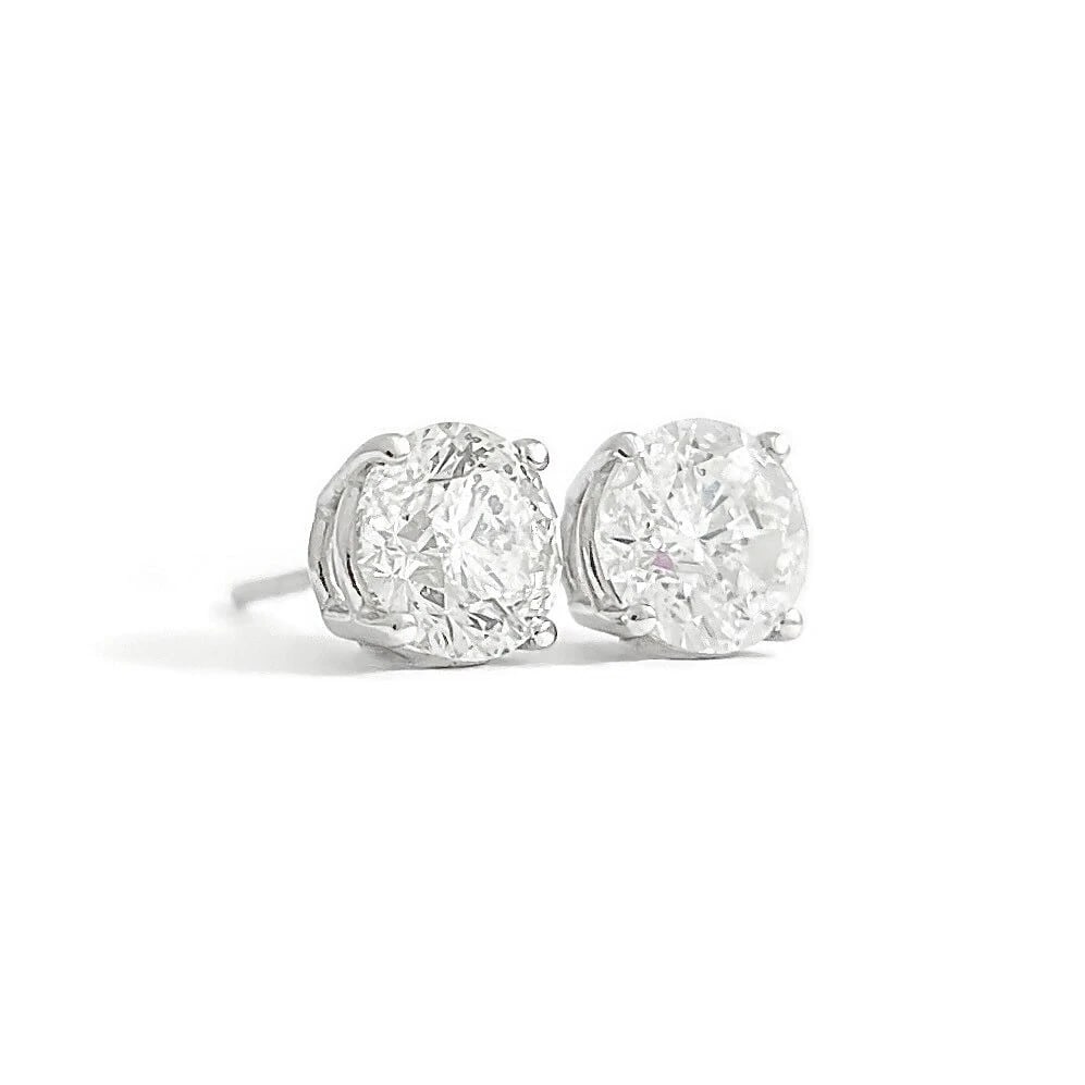 ROUND DIAMOND STUD EARRINGS 14K WHITE GOLD: Round Diamond Stud Earrings 14K White Gold Brand: Unbranded Type: Earrings Material: 14K white gold, Main Stone/Creation Natural Color: White Size: Measurements: 6.2 mm - 6.4 mm Accessories: None