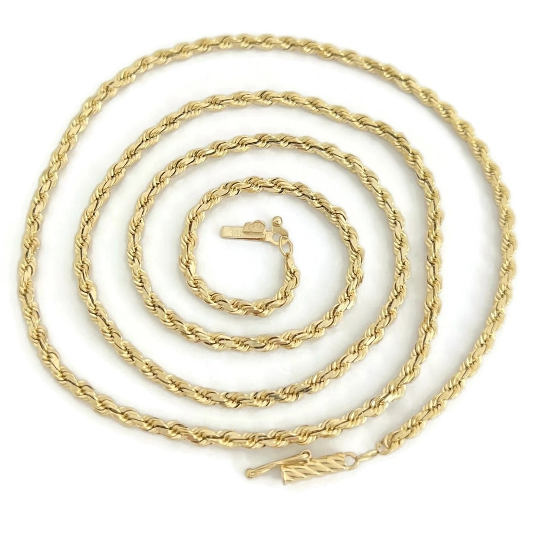LONG ROPE CHAIN NECKLACE 14K YELLOW GOLD: Long Rope Chain Necklace 14K Yellow Gold Brand: Unbranded Type: Necklace Material: 14K yellow gold, Color: Gold Size: Length: 21 inch Width: 2 mm Accessories: None Accessories Notice: When