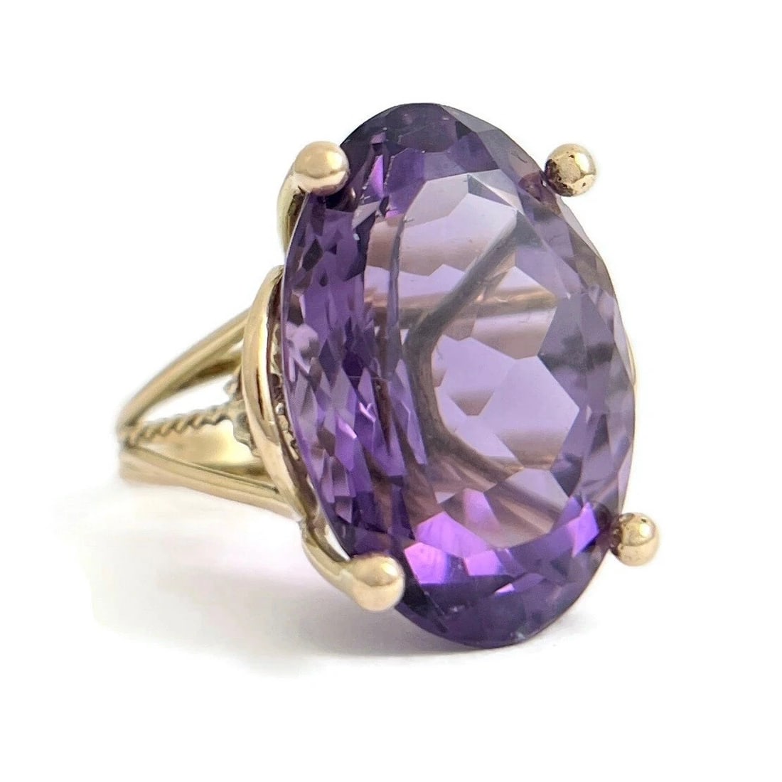 ESTATE BIG OVAL PURPLE AMETHYST COCKTAIL STATEMENT RING: Estate Big Oval Purple Amethyst Cocktail Statement Ring Brand: Estate Type: Ring Material: 14K yellow gold, Main Stone/Creation Natural Color: Purple Size: 9.25 US Accessories: None