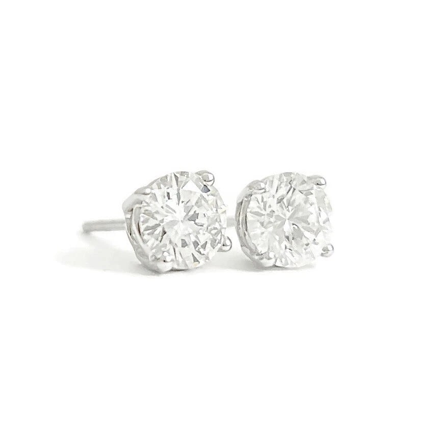 ROUND DIAMOND STUD EARRINGS 14K WHITE GOLD: Round Diamond Stud Earrings 14K White Gold Brand: Unbranded Type: Earrings Material: 14K white gold, Main Stone/Creation Natural Color: White Size: Measurements: 5.3 mm Accessories: None