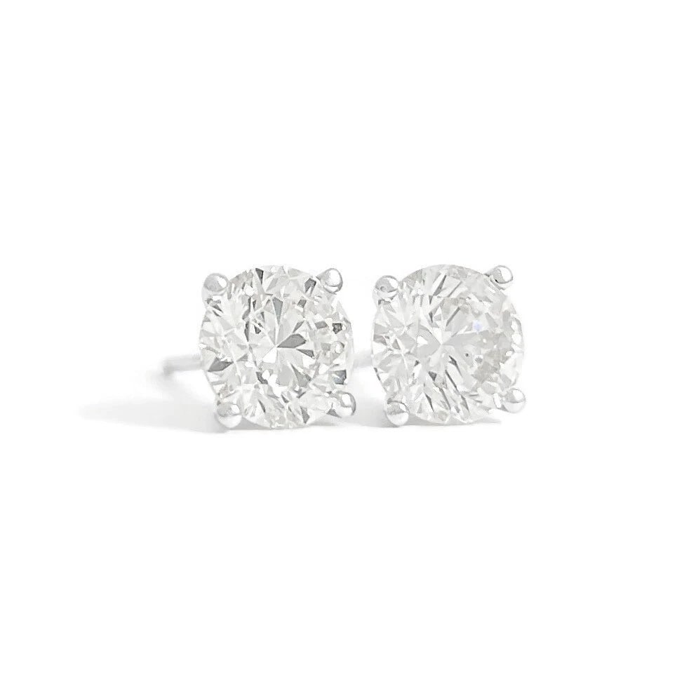 ROUND DIAMOND STUD EARRINGS 14K WHITE GOLD: Round Diamond Stud Earrings 14K White Gold Brand: Unbranded Type: Earrings Material: 14K white gold, Main Stone/Creation Natural Color: White Size: Measurements: 6.2 mm Accessories: None A