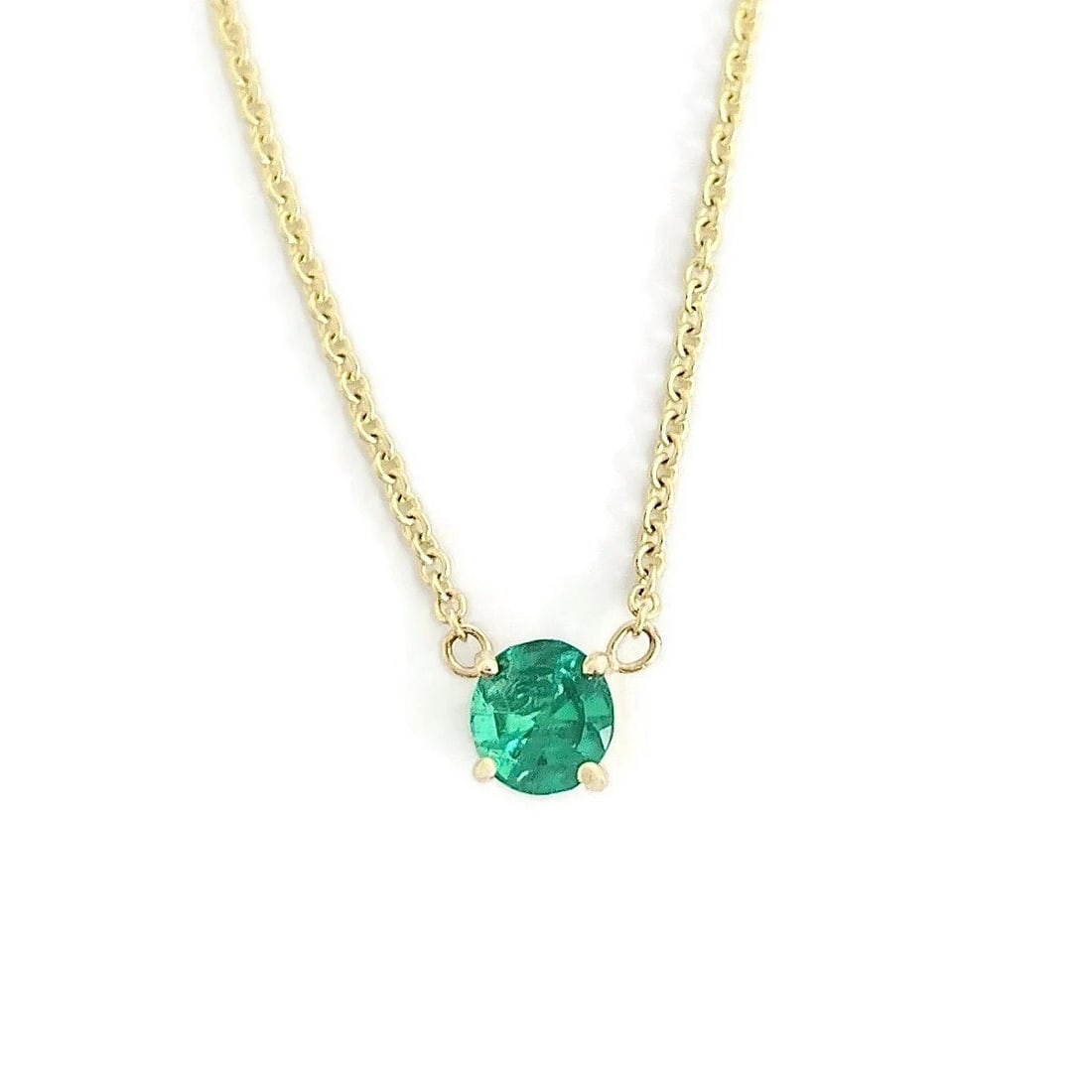 ROUND GREEN EMERALD SOLITAIRE PENDANT NECKLACE: Round Green Emerald Solitaire Pendant Necklace Brand: Unbranded Type: Necklace Material: 14K yellow gold, Main Stone/Creation Natural Color: Gold Size: Length: 16 inches Pendant: 5 mm Accessories