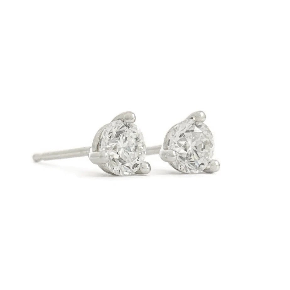 ROUND DIAMOND STUD EARRINGS 14K WHITE GOLD: Round Diamond Stud Earrings 14K White Gold Brand: Unbranded Type: Earrings Material: 14K white gold, Main Stone/Creation Natural Color: White Size: Measurements: 4.1 mm Accessories: None A