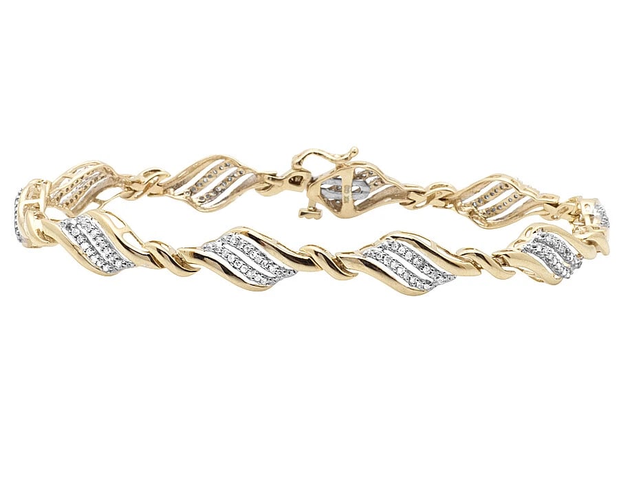 LADIES 10K YELLOW GOLD REAL DIAMOND TWISTED CUSTOM BRACELET: Ladies 10K Yellow Gold Real Diamond Twisted Custom Bracelet Brand: None Type: Bracelet Material: 10K Yellow Gold, Main Stone/Creation Natural Color: Gold Size: Length (inches) 7.5 Dimension7mm