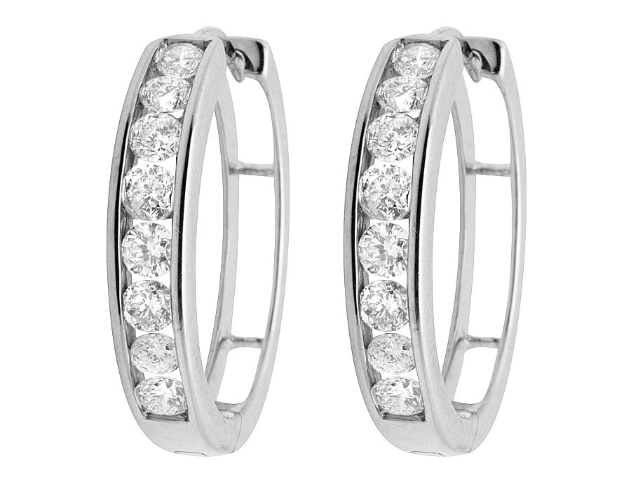 LADIES 10K WHITE GOLD DIAMOND CHANNEL HUGGIE HOOP EARRINGS: Ladies 10K White Gold Diamond Channel Huggie Hoop Earrings Brand: None Type: Earring Material: 10K White Gold, Main Stone/Creation Natural Color: White Size: Dimension 4mm wide, 20mm long Accesso
