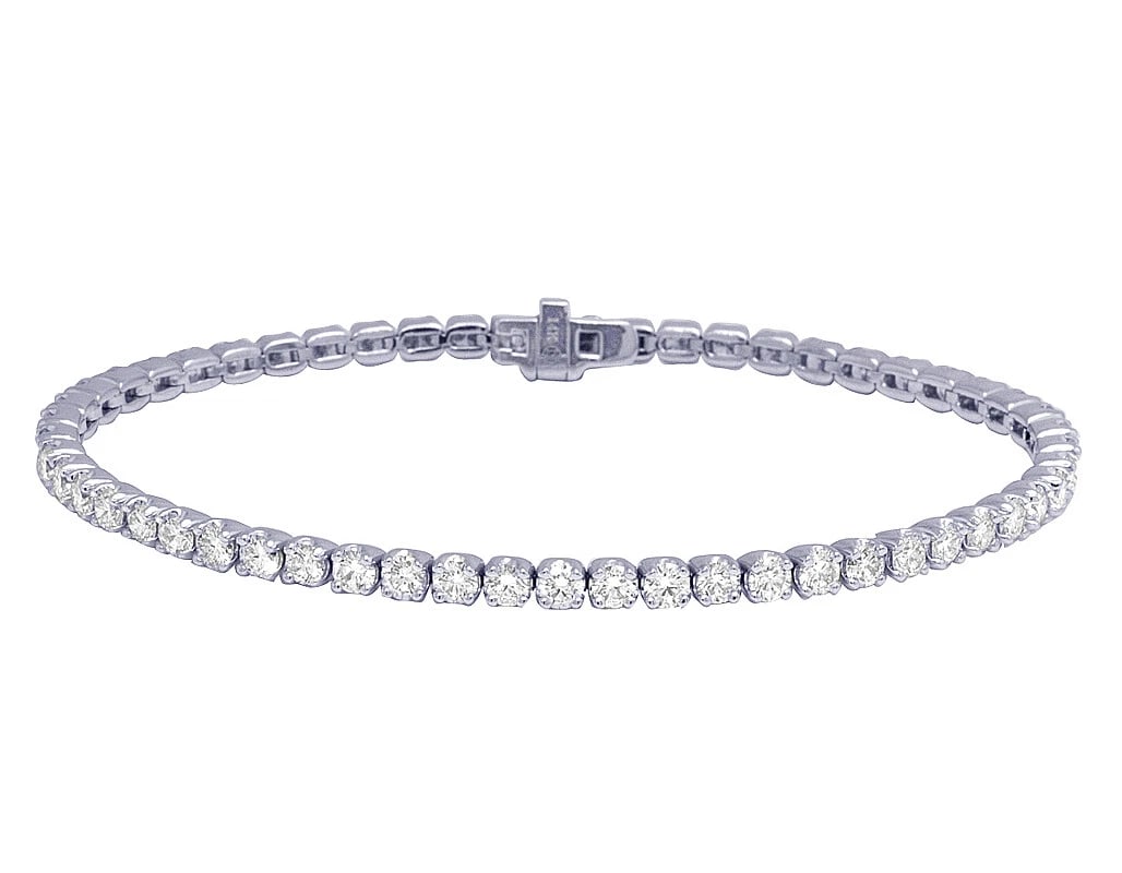 SINGLE ROW REAL DIAMOND TENNIS BRACELET 14K WHITE GOLD: Single Row Real Diamond Tennis Bracelet 14K White Gold Brand: None Type: Bracelet Material: 14K White Gold, Main Stone/Creation Natural Color: White Size: Length 7.25 in Dimension 3MM Accessories