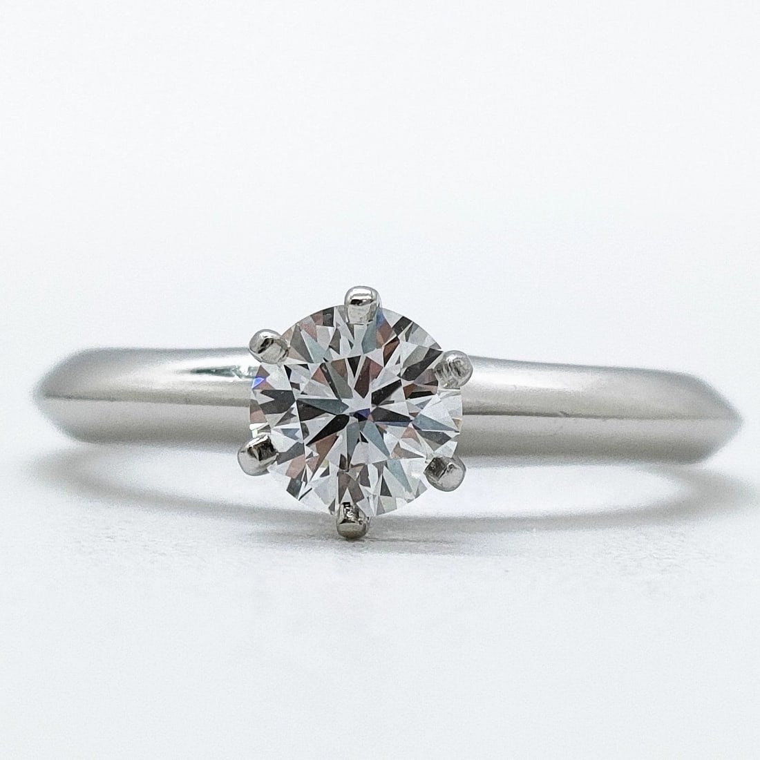 TIFFANY AND CO. RING SOLITAIRE NATURAL DIAMOND PLATINUM: Tiffany and Co. Ring Solitaire Natural Diamond Platinum Brand: Tiffany and Co. Type: Ring Material: Platinum, Color: Platinum Size: US 4 1/2 Accessories: None Accessories Notice: When